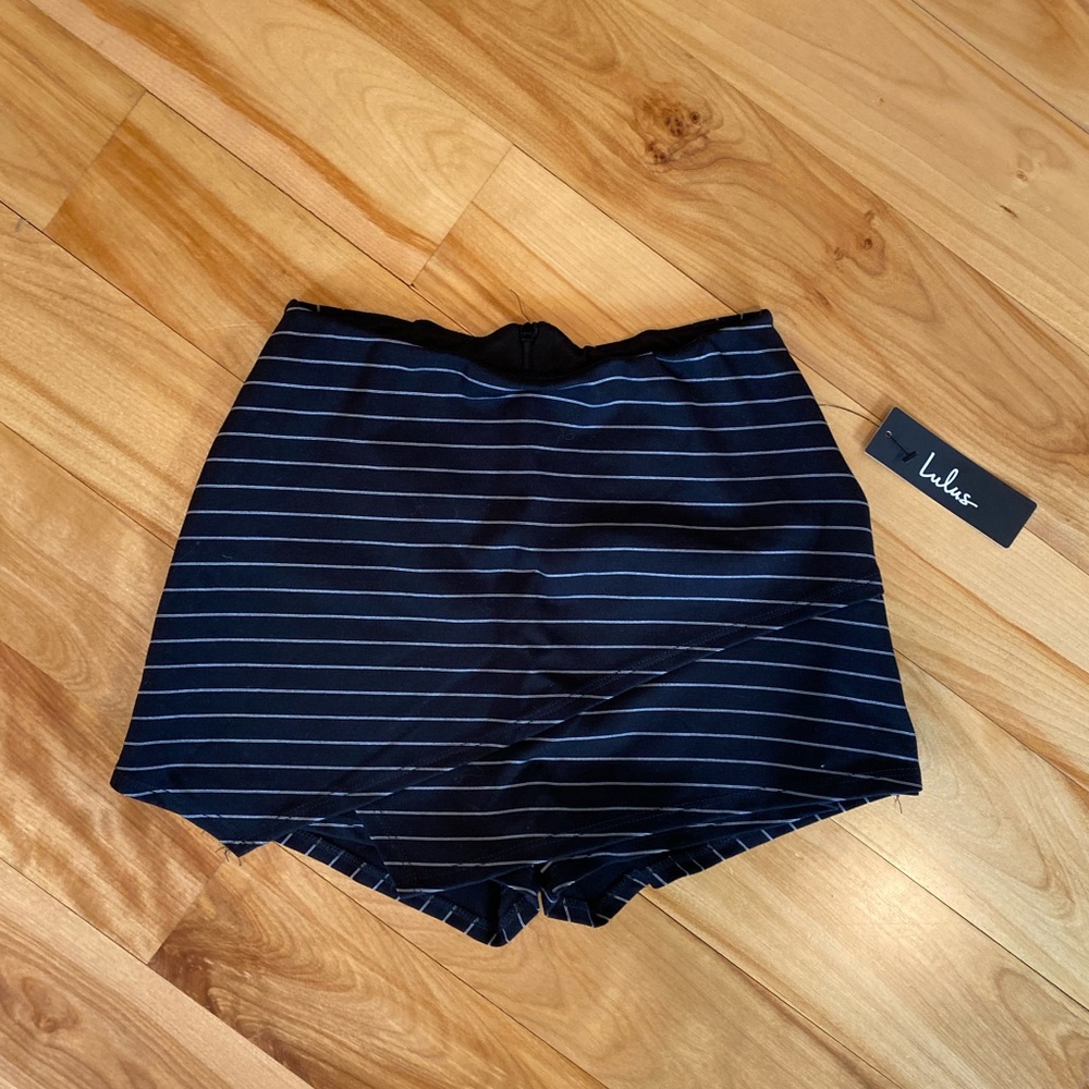 Layered shirt in the front/shorts in the back
